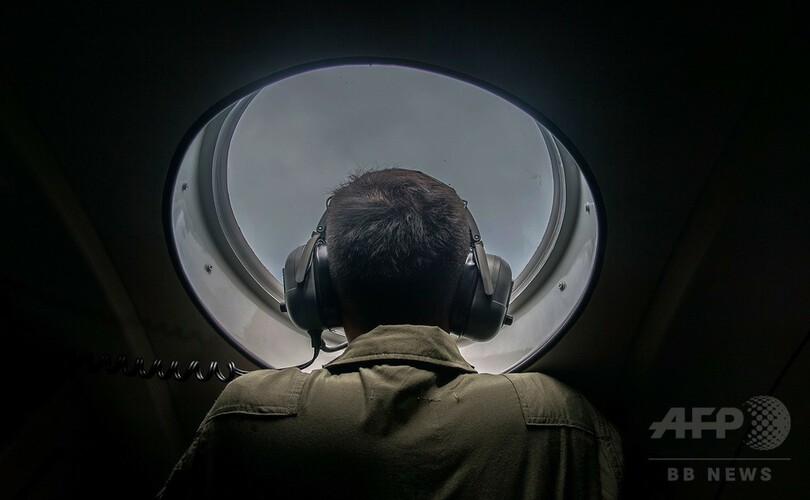 不明エアアジア機、直前に飛行経路の変更を要求