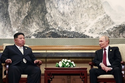 プーチン氏が金正恩氏と北京で会談