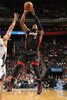 13-14NBA、シャーロット・ボブキャッツ（Charlotte Bobcats）対マイアミ・ヒート（Miami Heat）。得点を狙うマイアミ・ヒートのドウェイン・ウェイド（Dwayne Wade、2013年11月16日撮影）。(c)AFP/Getty Images/NBAE/Brock Williams-Smith