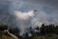 ポルトガル・オウレーンで起きた山火事の消火活動（2022年6月13日撮影）。(c)PEDRO ROCHA / AFP