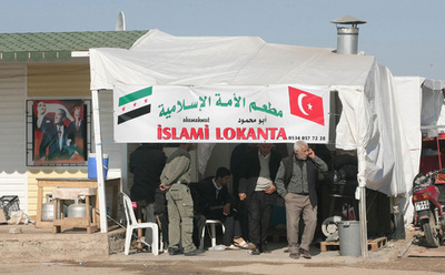 シリア難民にデビットカード配布、新しい支援の形を試験 国連など