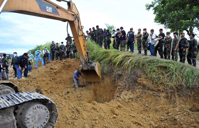 フィリピン知事選めぐる大量殺人、死者57人に 「両目を突き刺された」遺体も
