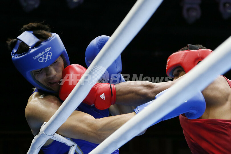 男子ミドル級を制した村田、日本勢48年ぶりの金メダル獲得