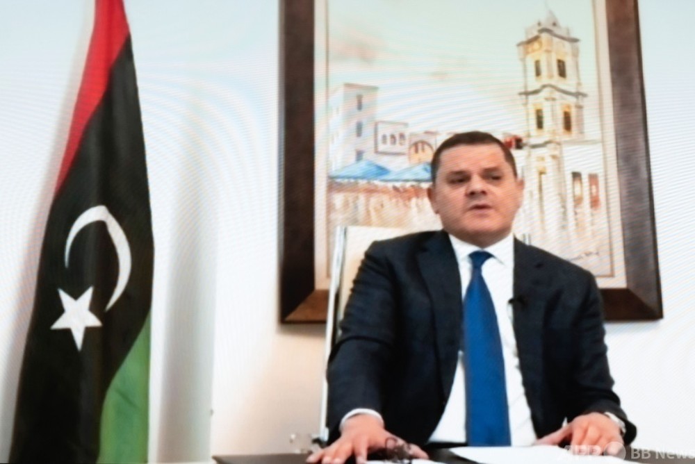 リビア、暫定首相ら選出 12月に選挙へ 懐疑的な見方も