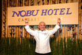 米ラスベガス（Las Vegas）で開催された「ノブ・ホテル シーザーズ・パレス（Nobu Hotel Caesars Palace）」のグランドオープニングパーティに出席した日本人シェフの松久信幸（Nobu Matsuhisa、2013年4月29日撮影）。(c)AFP/Getty Images/Ethan Miller