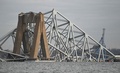 崩落したパタプスコ川に架かるフランシス・スコット・キー橋。米メリーランド州ボルティモアで（2024年3月26日撮影）。(c)ROBERTO SCHMIDT / AFP