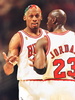 Chicago Bulls forward Dennis Rodman (L) explains himself to teammate Michael Jordan after being called for a technical foul 05 June in the first half of game one of the NBA Finals at the United Center in Chicago. (c)AFP/Brian BAHR
