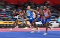 世界室内陸上選手権、男子60メートル決勝。レースに臨むイタリアのラモントマルチェル・ヤコブス（中央、2022年3月19日撮影）。(c)ANDREJ ISAKOVIC / AFP