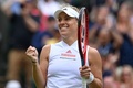 テニス、ウィンブルドン選手権、女子シングルス4回戦。勝利を喜ぶアンゲリク・ケルバー（2021年7月5日撮影）。(c)Glyn KIRK / AFP