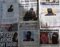 第1面に覆面姿のイスラム過激派組織「イスラム国」戦闘員、通称「ジハーディ・ジョン」の身元特定に関する記事を掲載した英各紙（2015年2月27日撮影、資料写真）。(c)AFP/DANIEL SORABJI