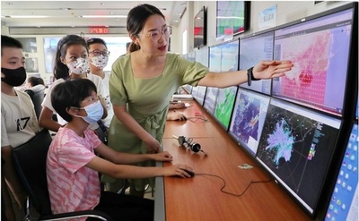 気象サービスを推進し、澄んだ水と緑の山々を守る 中国