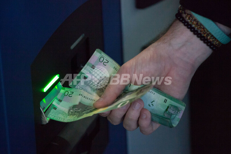 ビットコイン、初の1000ドル突破 1か月で約5倍に