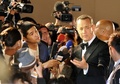 第26回東京国際映画祭（Tokyo International Film Festival）のオープニングイベントに登場したトム・ハンクス（Tom Hanks、2013年10月17日撮影）。(c)AFP/TOSHIFUMI KITAMURA