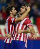 サッカー欧州チャンピオンズリーグ2013-14（UEFA Champions League 2013-14）グループG第4節、アトレティコ・マドリード（Atletico de Madrid）対オーストリア・ウィーン（Austria Vienna）。得点を挙げ歓喜するアトレティコ・マドリードのジエゴ・コスタ（Diego da Silva Costa、右、2013年11月6日撮影）。(c)AFP/JAVIER SORIANO