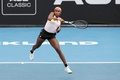 テニス、ASBクラシック、女子シングルス決勝。リターンを打つココ・ガウフ（2023年1月8日撮影）。(c)DAVID ROWLAND / AFP