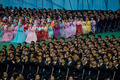 北朝鮮・平壌（Pyongyang）の綾羅島メーデースタジアム（Rungnado May Day Stadium、収容人数15万人）で26日、恒例の「アリラン祭（Arirang Festival）」のマスゲームが行われた。

朝鮮戦争の休戦60周年をテーマに行われる今年のマスゲームには約10万人が参加。一糸乱れぬ体操やダンス、アクロバットなどの集団パフォーマンスや演劇などが披露される（2013年7月26日撮影）。(c)AFP/Ed Jones