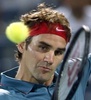 ドバイ・テニス選手権（Dubai Duty Free Tennis Championships 2014）、男子シングルス準決勝。リターンを打つロジャー・フェデラー（Roger Federer、2014年2月28日撮影）。(c)AFP/KARIM SAHIB