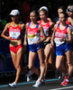 第13回世界陸上大邱大会（13th IAAF World Championships in Athletics Daegu）は31日、5日目の競技が行われ、女子20キロメートル競歩決勝でロシアのオリガ・カニスキナ（Olga Kaniskina）が1時間29分42秒で優勝し、大会3連覇を果たした。

レースに臨むオリガ・カニスキナ（中央左、2011年8月31日撮影）。(c)AFP/MARK RALSTON
