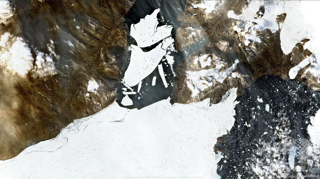 「パリ1個分」の氷塊分離、北極圏最大の氷棚で観測 グリーンランド 「パリ1個分」の氷塊分離、北極圏最大の氷棚で観測 グリーンランド