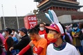 北京マラソンに臨むマスク姿のランナー（2022年11月6日撮影）。(c)WANG Gao/ AFP