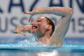 第15回世界水泳選手権（15th FINA World Championships）は24日、スペイン・バルセロナ（Barcelona）でシンクロナイズドスイミングのソロフリールーティン（FR）決勝が行われ、ロシアのスベトラナ・ロマシナ（Svetlana Romashina）が優勝した。

2位には中国の黄雪辰（Huang Xuechen）、3位にはスペインのオナ・カルボネール・バレステロ（Ona Carbonell Ballestero）が入った。

ソロFR決勝の演技に臨むスベトラナ・ロマシナ（2013年7月24日撮影）。(c)AFP/JAVIER SORIANO