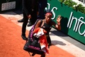 全仏オープンテニス、女子シングルス準々決勝。試合を終えコートを去るコリ・ガウフ（2021年6月9日撮影）。(c)MARTIN BUREAU / AFP