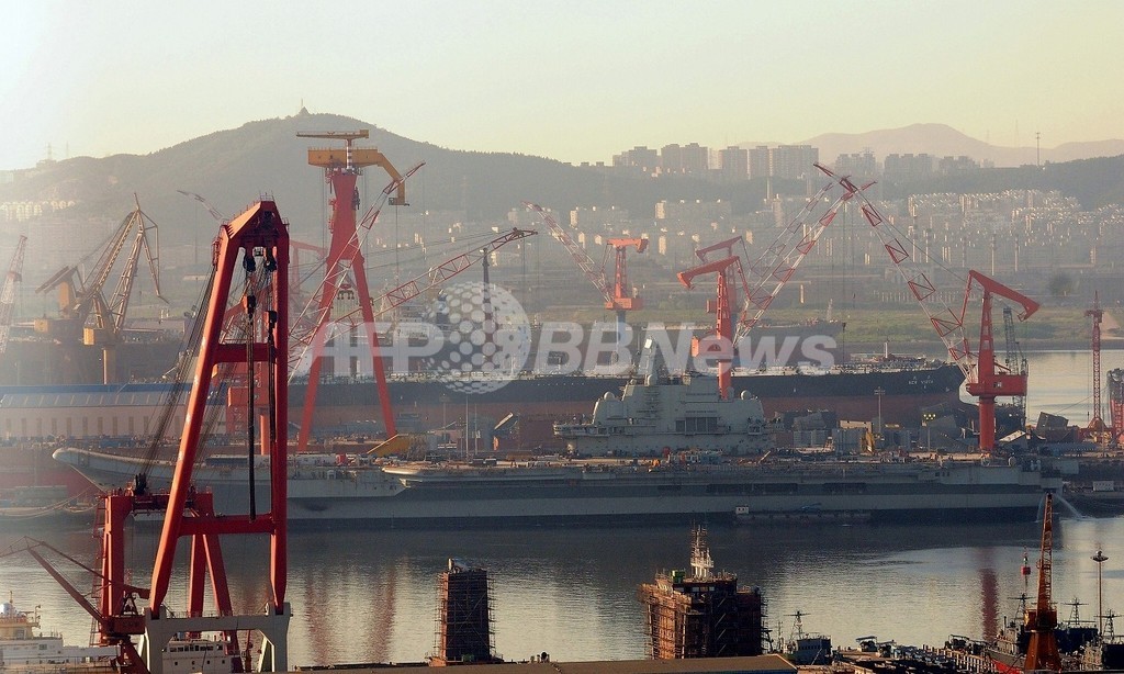 中国初の空母、「軍事力強化が目的ではない」 国防省 中国初の空母、「軍事力強化が目的ではない」 国防省