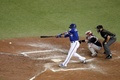 16MLBプレーオフ、ア・リーグ優勝決定シリーズ（7回戦制）、トロント・ブルージェイズ対クリーブランド・インディアンス。7回に適時二塁打打を放ったトロント・ブルージェイズのエドウィン・エンカーナシオン（2016年10月18日撮影）。(c)AFP/Getty Images/Elsa