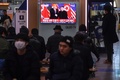 テレビに映し出されたドナルド・トランプ米大統領と金正恩（キム・ジョンウン）朝鮮労働党委員長。韓国ソウルにて（2019年2月27日撮影、資料写真）。(c)Jung Yeon-je / AFP
