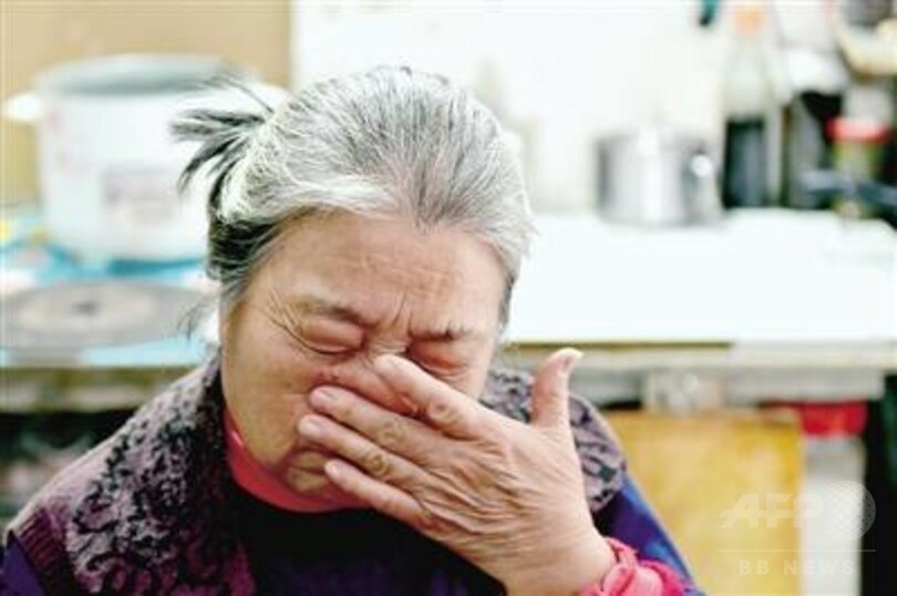 脳性まひの子が携帯電話につづった養親への「手紙」　中国・河南