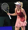 女子テニス、WTAツアー選手権（BNP Paribas WTA Championships - Singapore 2014）4日目。試合に臨むカロリーネ・ボズニアツキ（Caroline Wozniacki、2014年10月23日撮影）。(c)AFP/ROSLAN RAHMAN