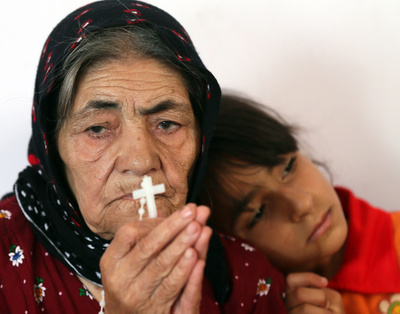 イスラム過激派、キリスト教徒追い出し十字架降ろす イラク