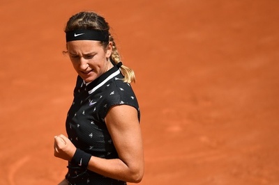 大坂との新旧女王対決は「普通の試合」、アザレンカが不敵な笑み