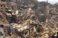 南米チリ中部バルパライソ（Valparaiso）で起きた火災によって全焼した住宅地（2014年4月13日撮影）。(c)AFP/FELIPE GAMBOA