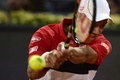 テニス、マドリード・オープン、男子シングルス準々決勝。リターンを打つ錦織圭（2015年5月8日撮影）。(c)AFP/JAVIER SORIANO