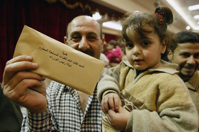 イラク難民の帰還、シリアから第一陣がバグダッドに到着