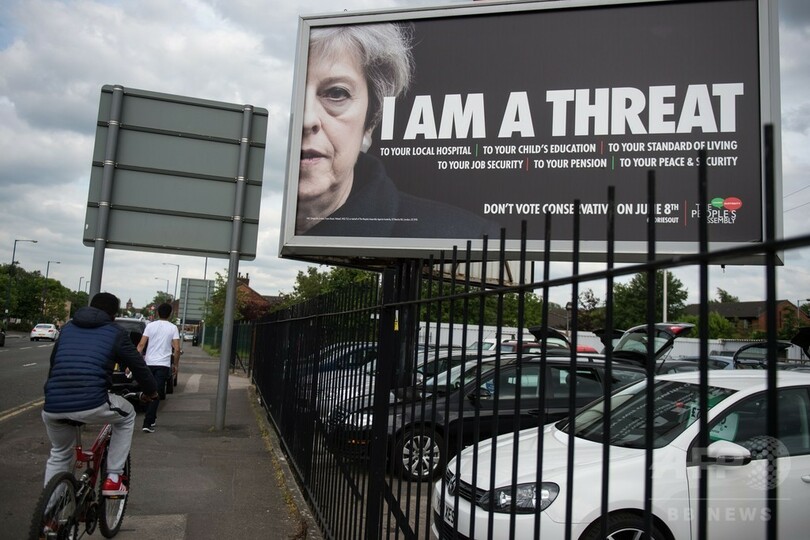 反与党の選挙ポスターにメイ英首相登場？「私は脅威だ」