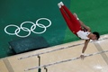 リオデジャネイロ五輪、体操男子予選。平行棒の演技に臨む田中佑典（2016年8月6日撮影）。(c)AFP/Antonin THUILLIER