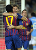 サッカー、ジョアン・ガンペール杯（Joan Gamper Trophy 2011）は22日、スペイン・バルセロナ（Barcelona）のカンプ・ノウ（Camp Nou stadium）で行われ、FCバルセロナ（FC Barcelona）が5-0でナポリ（SSC Napoli）に勝利した。

得点を決めペドロ・ロドリゲス・レデスマ（Pedro Rodriguez Ledesma、手前）と喜ぶFCバルセロナのリオネル・メッシ（Lionel Messi、2011年8月22日撮影）。(c)AFP/JOSEP LAGO