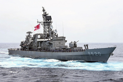 Japan approves record $56 bn defence budget