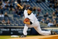 14MLB、ニューヨーク・ヤンキース（New York Yankees）対ボルチモア・オリオールズ（Baltimore Orioles）。先発登板したニューヨーク・ヤンキースの田中将大（Masahiro Tanaka、2014年4月9日撮影）。(c)AFP/Getty Images/Jim McIsaac