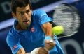 テニス、ドバイ・テニス選手権、男子シングルス2回戦。リターンを狙うノバク・ジョコビッチ（2015年2月25日撮影）。(c)AFP/MARWAN NAAMANI