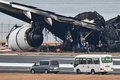 海上保安庁の航空機と衝突した日本航空（JAL）の旅客機。東京国際（羽田）空港で（2024年1月3日撮影）。(c)Richard A. Brooks / AFP