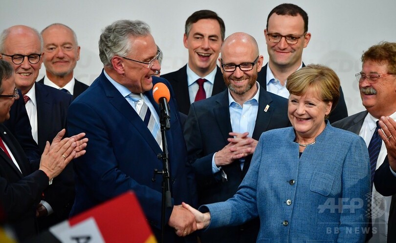 独下院選で与党勝利、メルケル首相4選へ 新興極右が第3党に