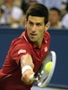男子テニス、上海マスターズ（2014 Shanghai Rolex Masters）シングルス準決勝。リターンを狙うノバク・ジョコビッチ（Novak Djokovic、2014年10月11日撮影）。(c)AFP/GOH CHAI HIN