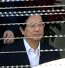 台湾・台北（Taipei）郊外の土城（Tucheng）の拘置所から台北地方法院（地裁）に公判のため移送される陳水扁（Chen Shui-bian）前総統（2009年3月4日撮影）。(c)AFP/Sam YEH