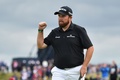 男子ゴルフ米国ツアーメジャー第4戦、第148回全英オープン3日目。15番でパットを決め、ガッツポーズを見せるシェーン・ローリー（2019年7月20日撮影）。(c)Glyn KIRK / AFP