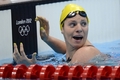 ロンドン五輪、競泳女子100メートル背泳ぎ予選。58秒23で五輪記録を更新し、1位で準決勝進出を果たしたオーストラリアのエミリー・シーボーン（Emily Seebohm、2012年7月29日撮影）。(c)AFP/LEON NEAL