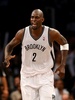 13-14NBAプレーオフ1回戦（7回戦制）、ブルックリン・ネッツ（Brooklyn Nets）対トロント・ラプターズ（Toronto Raptors）第6戦。歓喜するブルックリン・ネッツのケビン・ガーネット（Kevin Garnett、2014年5月2日撮影）。(c)AFP/Getty Images/Elsa