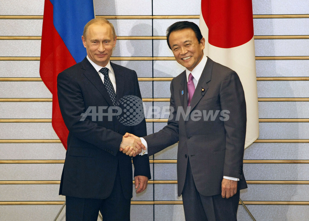 麻生首相 プーチン露首相と会談 日露原子力協定に署名 国際ニュース Afpbb News